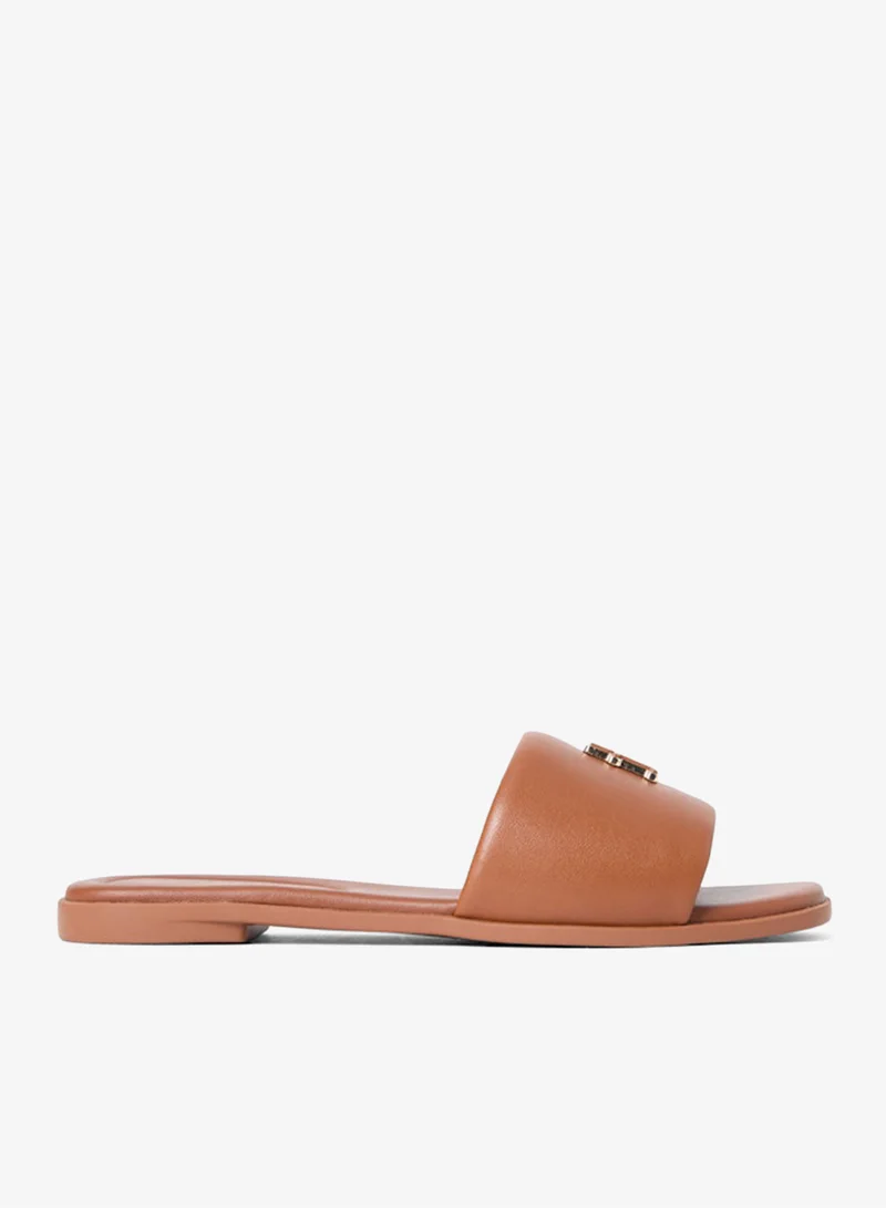 تومي هيلفيغر Leather Monogram Strap Mules